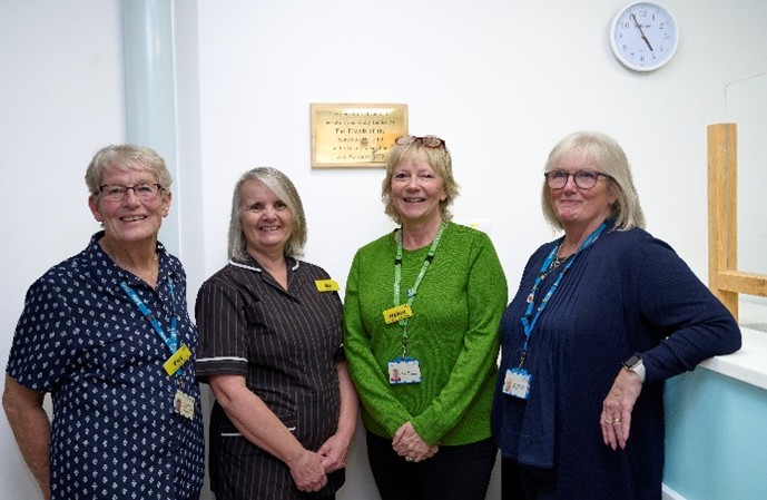 Pictured beneath the newly unveiled plaque are Locality Manager Helen Lawes, Matron Ali Low, Lead HSCC Jude Dyson-Coope, and Receptionist Fay Leadbitter..jpg